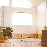 Striff Master Bath 2 of 4 - The clerestory windows allow lots of light to flood the space, while the lower window allows for ventilation. The use of ceramic tiles creates an elegant look.