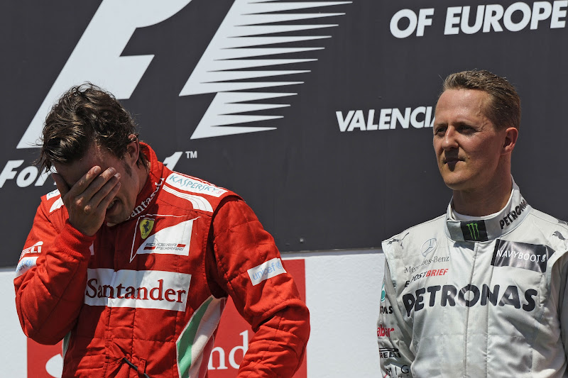 Фернандо Алонсо и Михаэль Шумахер на подиуме Гран-при Европы 2012