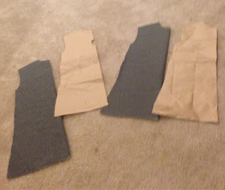 Cutting the fabric for the tunic.