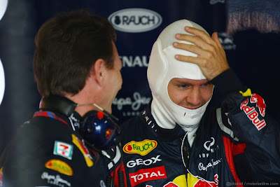 Себастьян Феттель фэйспалмит перед Кристианом Хорнером на Гран-при Японии 2011
