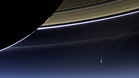 In this rare image taken on July 19, 2013, the wide-angle camera on NASA's Cassini spacecraft has captured Saturn's rings and our planet Earth and its moon in the same frame. (NASA/JPL-Caltech/Space Science Institute)