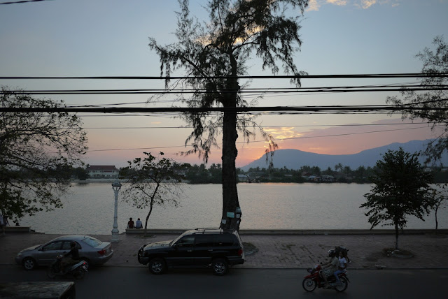 second story view of a river and mountains in Kampot, Cambodia