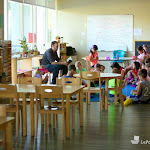 Reading aloud to students is important even after they learn to read by themselves. In our elementary program, children experience literature above their own reading level during regular read-aloud sessions. Note that many of the students here are knitting or crocheting while listening: they are practicing fine motor skills while enjoying the story! Reading aloud to students is important even after they learn to read by themselves. In our elementary program, children experience literature above their own reading level during regular read-aloud sessions. Note that many of the students here are knitting or crocheting while listening: they are practicing fine motor skills while enjoying the story!