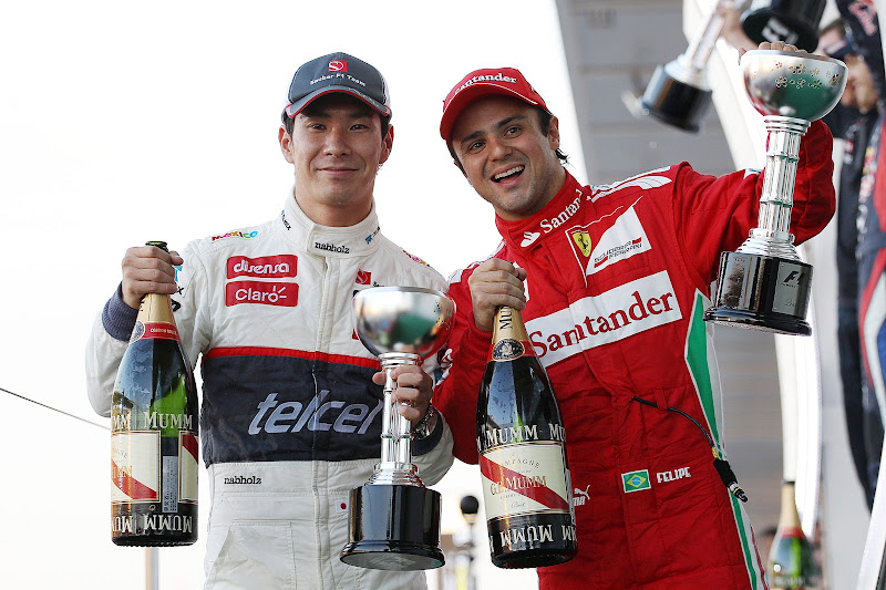 Камуи Кобаяши и Фелипе Масса на подиуме Гран-при Японии 2012
