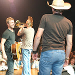 Aden snuck up for a trombone solo...Dierks is in stitches.