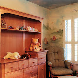 Lyra Nursery 2 of 2 - The glider and ottoman create a quiet space for rocking and cuddling.