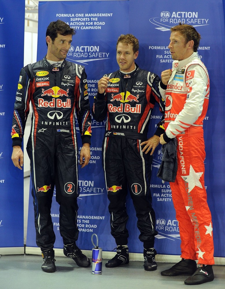 Марк Уэббер, Себастьян Феттель и Дженсон Баттон после квалификации на Гран-при Сингапура 2011