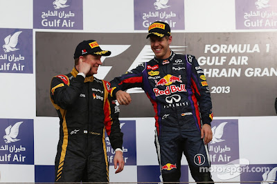 Кими Райкконен и Себастьян Феттель на подиуме Гран-при Бахрейна 2013