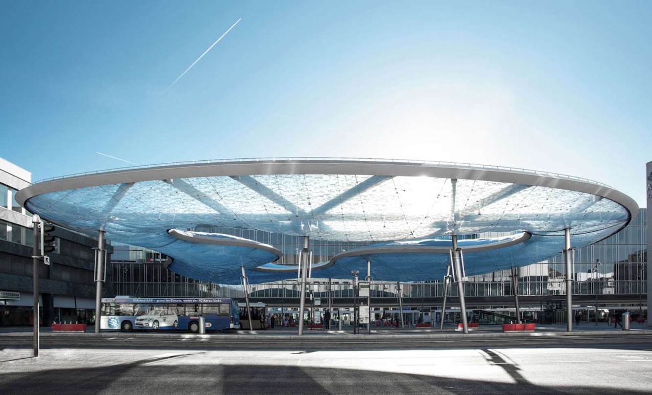 Bus terminal and train station square by Vehovar