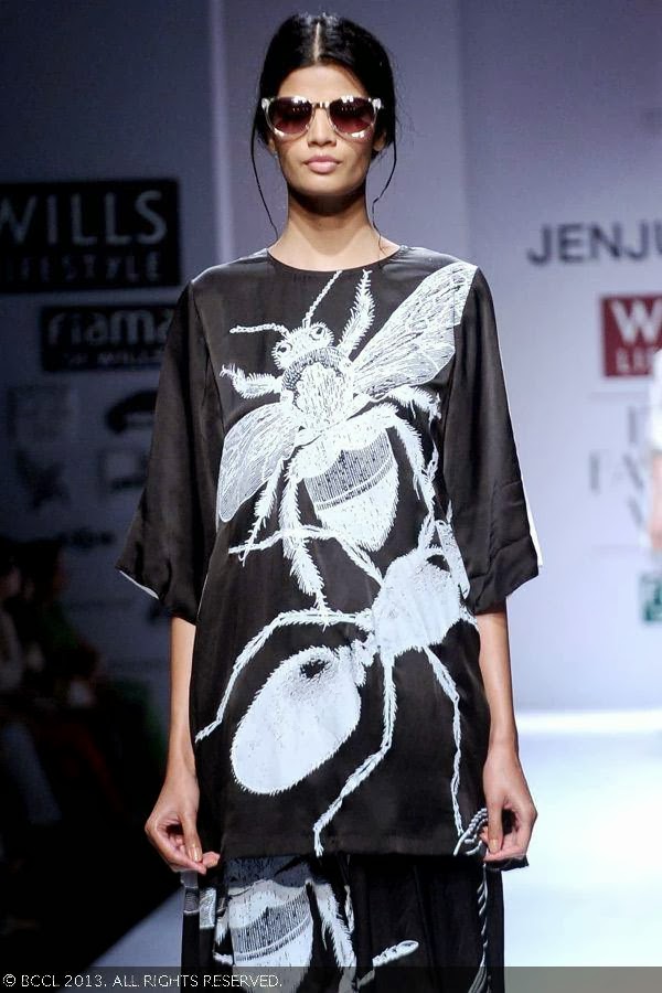 Sony walks the ramp for fashion designer Jenjum Gadi on Day 3 of the Wills Lifestyle India Fashion Week (WIFW) Spring/Summer 2014, held in Delhi.