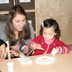 Toddlers serve their own snack at the LePort Schools Parent & Child Montessori.