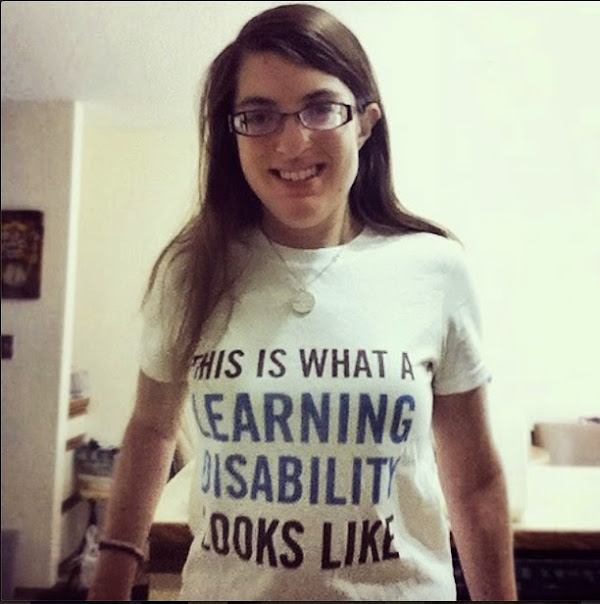Me, wearing a shirt reading "this is what a learning disability looks like"