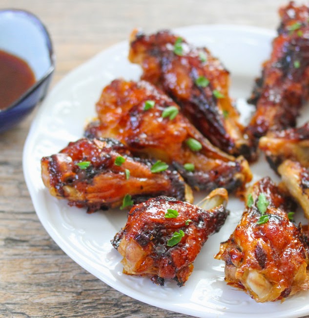 photo of chicken wings on a white plate