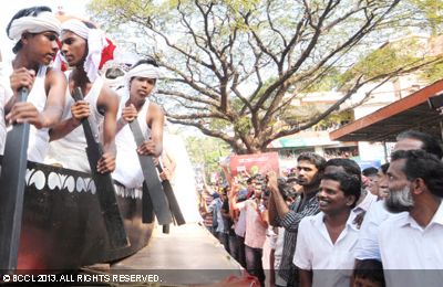 Kids participate in the procession as part of the state school art festival held at Malappuram in Kochi on January 14, 2013.