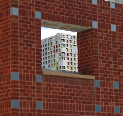 a corner of Spongebob Squaredorm as seen through a hole in a wall that may have been designed with that view in mind