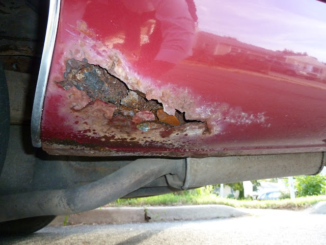 $250 quote to fix quarter panel rust P1010609