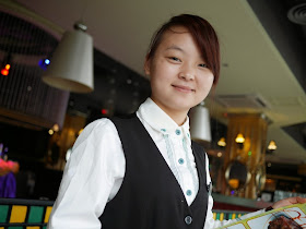 waitress at the Greenery Cafe in Zhanjiang