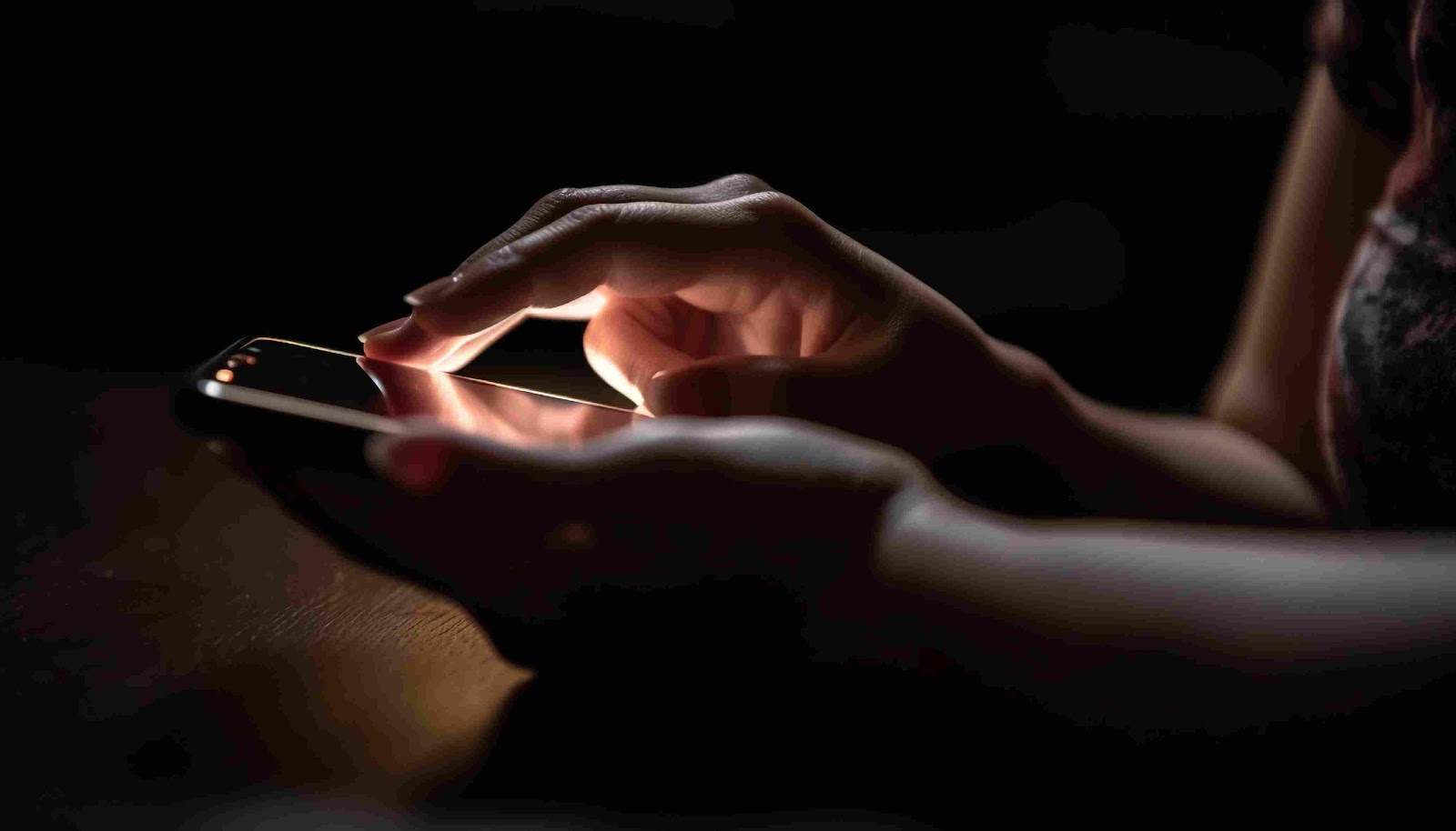 Close-up of hands using a touch screen device

Description automatically generated