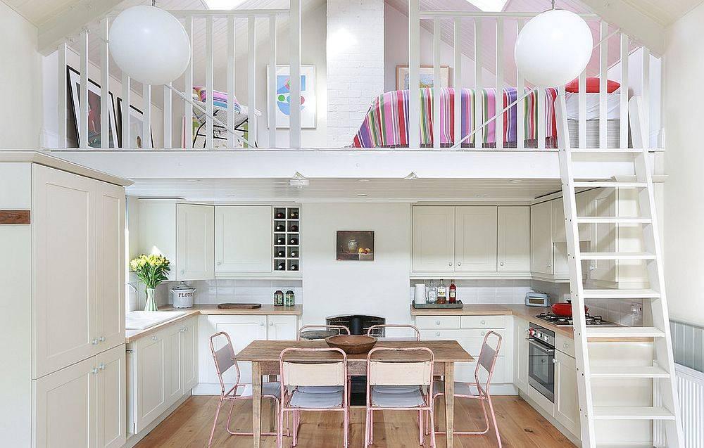 small kitchen under the minimalist stairs