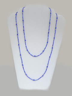 Graceful Flow - Alternatig light & dark blue Crystals and Glass beads $25" $24