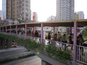 heavy foot traffic on an elevated walkway in Tsuen Wan, Hong Kong