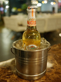 Shancheng Beer 1958 (9.5°) in a metal bucket of ice