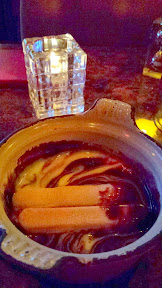 Urban Fondue, dessert fondue of Tiramisu fondue with creamed chocolate swirled with espresso and topped with lady fingers