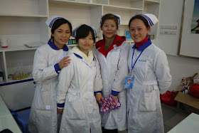 four woman working at a pharmacy in Putian, China