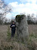 Brampton Standing Stone with Kat next to it to demonstrate the sheer size of this lump of rock