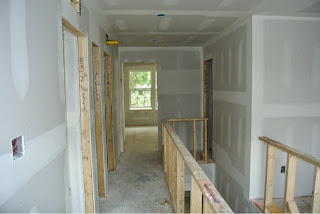 Ryan Homes Florence Model upstairs hallway just after drywall installed Picture of the upstairs hallway just after drywall installed
