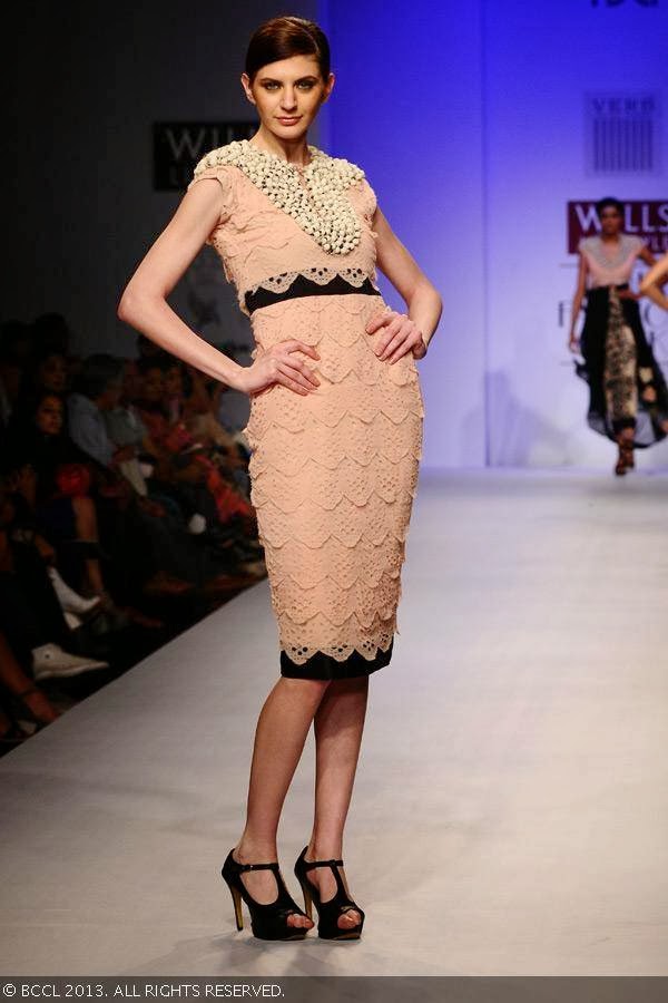 Olga showcases a creation by fashion designer Pallavi Singhee on Day 5 of Wills Lifestyle India Fashion Week (WIFW) Spring/Summer 2014, held in Delhi.<br /> 