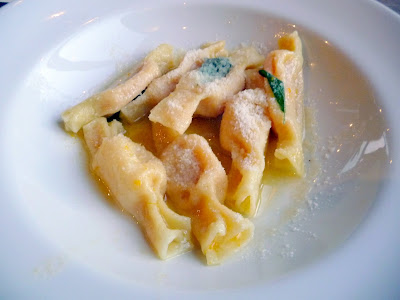 Handmade Pasta at Nostrana, by Francesca Tori, Caramelle candy-shaped pasta filled with Red Kuri squash, nutmeg, parmigiano, and sage butter, Cathy Whims 