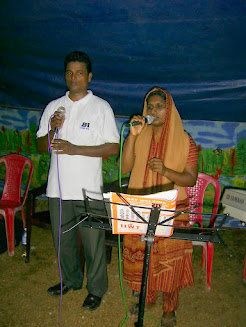 Pastor Sabu and his wife ministering together in Kerala