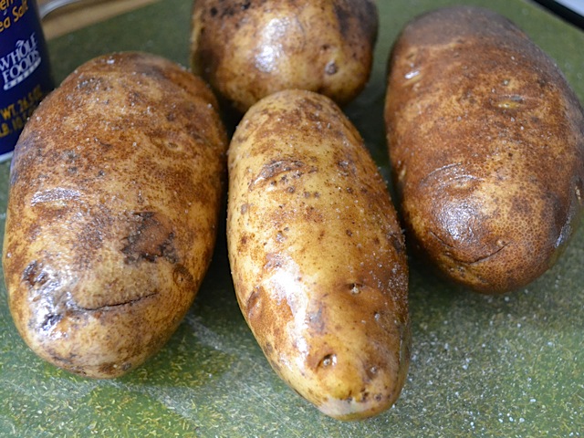olive oil and salt rubbed on potatoes 