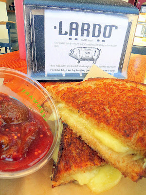 From Lardo, the Jenn Louis chefwich, a grilled cheese with fontina cheese, plum conserva on Grand Central Bakery sour rye. A portion of the proceeds of the sandwich benefits the Oregon Food Bank.