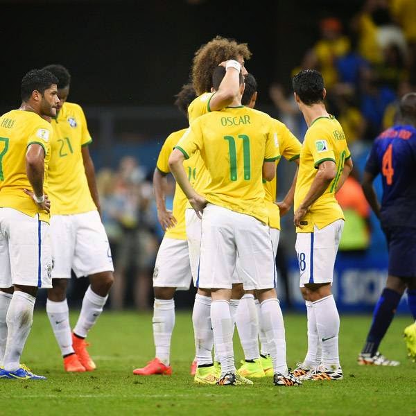  Brazil's players react at the end of the third place play-off football match between Brazil and Netherlands during the 2014 FIFA World Cup at the National Stadium in Brasilia on July 12, 2014.