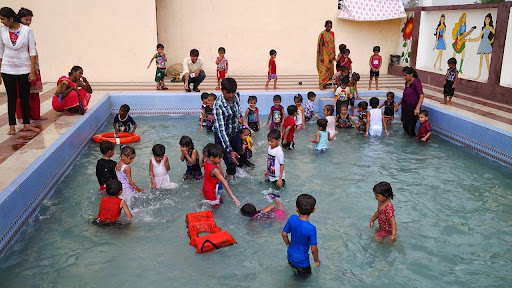 Dolls N Dudes Preschool, Opp: GIDC, N/r: Reva Township, Sanala Rd, Ravapar, Madhapar Part, Gujarat 363641, India, School, state GJ
