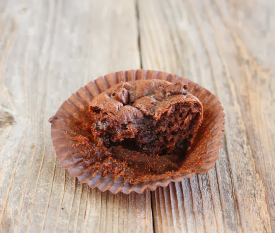 photo of one Flourless Chocolate Peanut Butter Muffin sliced in half