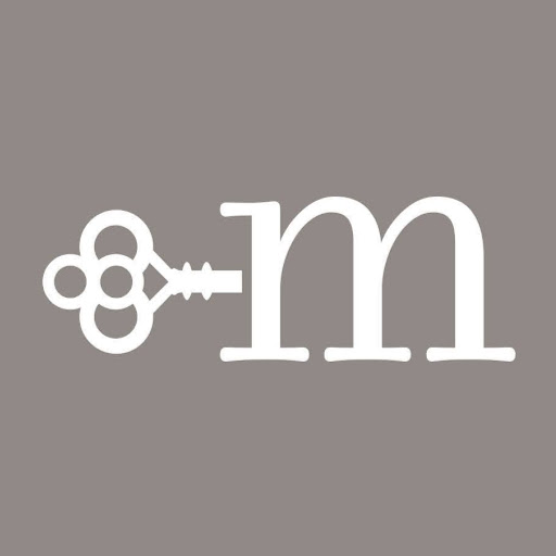 The Mini Time Machine Museum of Miniatures logo