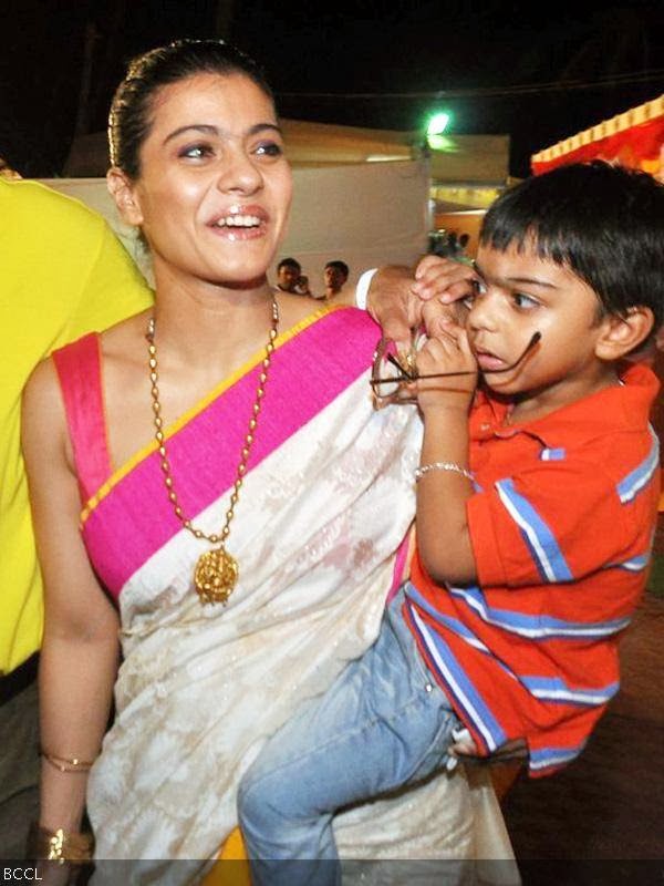 Kajol seen with son Yug during Durga Puja celebrations, held in Mumbai, on October 10, 2013. (Pic: Viral Bhayani)