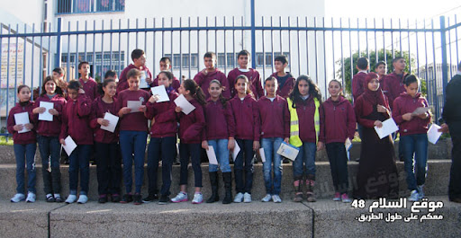 توزيع شهادات للطلاب الذين شاركوا في حملة "اطرق الباب" في الزهراء جت ___%252011%2520377