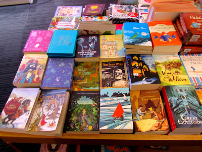 Table display of children's classics at the British Library bookshop