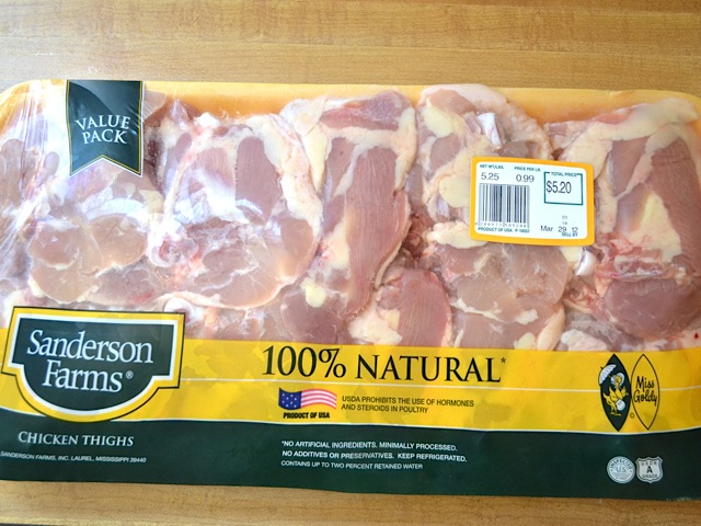 Package of raw chicken thighs 