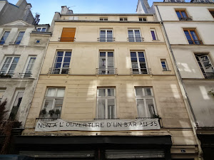 Façade avec ancres à demi-masquées sous enduit 37 rue de Poitou à Paris