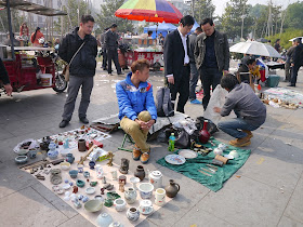 at an outdoor antique market in Changsha, China