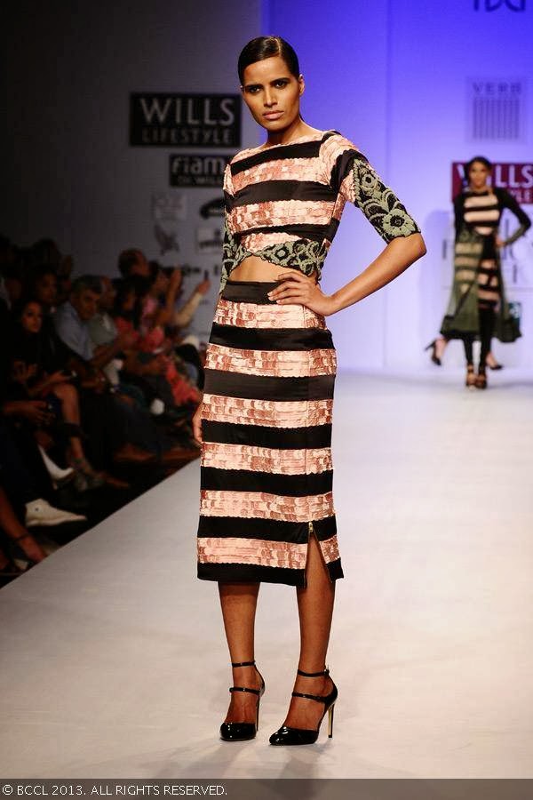Preeti showcases a creation by fashion designer Pallavi Singhee on Day 5 of Wills Lifestyle India Fashion Week (WIFW) Spring/Summer 2014, held in Delhi.