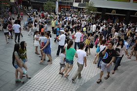 crowds at Dongmen shopping area in Shenzhen, China