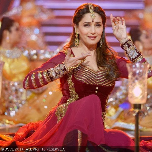 Madhuri Dixit grooves to some happening numbers as she performs on stage at the 59th Idea Filmfare Awards 2013, held at the Yash Raj Studios in Mumbai, on January 24, 2014.