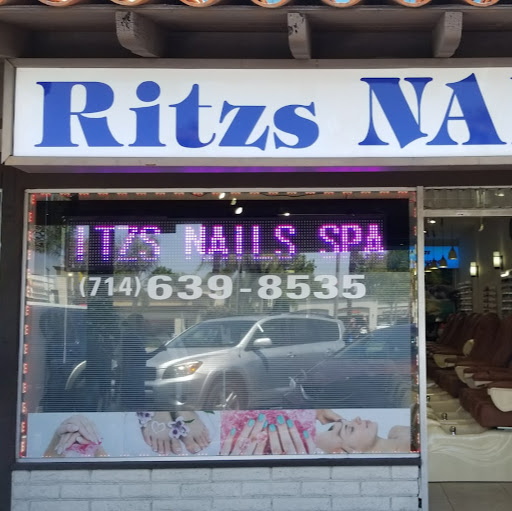 Ritzs Nails & Spa logo
