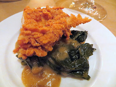 Happiness is an Irving St Kitchen fried chicken with smashed potatoes and country gravy and greens.